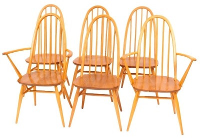 A set of six elm and beech Ercol chairs, each with a turned spindle back, solid seat, on turned tapering legs, (4+2).