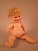 A Burggrub Princess Elizabeth bisque headed doll