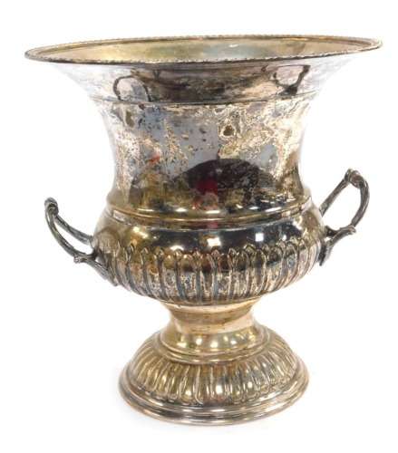 A silver plated two handled wine cooler, of campana form, with liner, 24cm high.