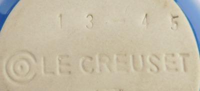 A group of Le Creuset homewares, comprising a set of four 0.35 litre light blue mugs, four 0.1 litre espresso mugs in pale blue, a turquoise butter dish and lid, and three pine dishes, and two miniature casserole dish. (1 tray) - 3