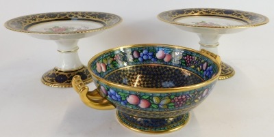 A late 19thC Booths china part service, comprising five dinner plates and two centrepiece bowls, each with a dark blue and gilded border with transfer printed floral decorated to centre, and a Minton Rotique pattern fruits and flowers bowl, on a blue and - 5