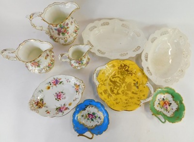 Decorative china, comprising a set of three Dresden Sprays Hammersley jugs, two French Limoges style floral pin dishes, a Royal Crown Derby Derby Posies oval serving tray, a Coalport Yellow Wild Bird pattern bowl, and two Pearlware oval serving trays. (a - 2