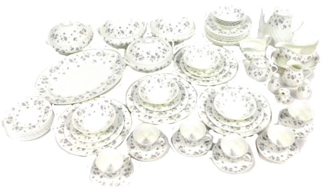 A Wedgwood porcelain part tea and dinner service decorated in the April Flowers pattern, to include four lidded tureens and covers, two gravy boats, teapot, teacups and saucers, dinner plates, side plates, etc.