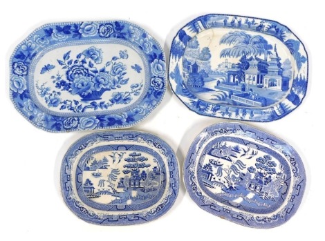 Four 19thC Staffordshire blue and white meat plates, comprising an ironstone china oval Willow pattern plate, 38cm diameter, a stone china oval serving plate, 40cm diameter, 19thC English blue and white serving plate with Oriental decoration, 48cm diamete