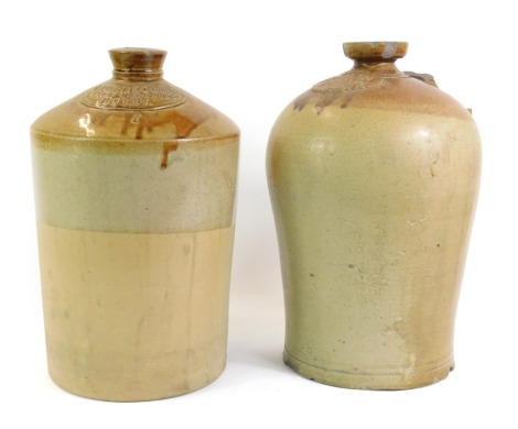 Two 19thC stoneware flagons, comprising a two gallon flagon with crest RJS Hilcook Wine Merchant Bourn, 41cm high, and another two gallon example bearing cream IN Pass of Boston 1829, 43cm high. (2, AF)