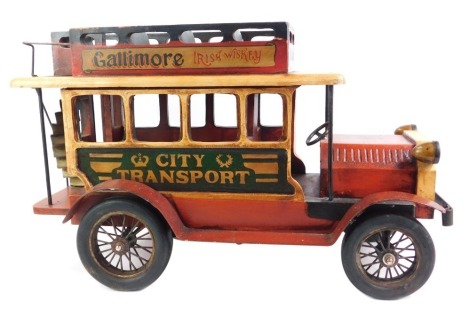 A Colin's Mustard wooden painted advertising City of Transport bus, 41cm high, 62cm wide, 29cm deep.