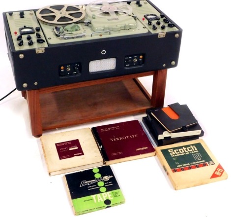 A Wearite Vortexion 1960s type CBL6 reel to reel studio tape player/recorder, together with wooden stand and various tapes. Provenance: The former property of Peter Ampleford part of the Williams Formula 1 Racing Team and by descent to his son who kindly