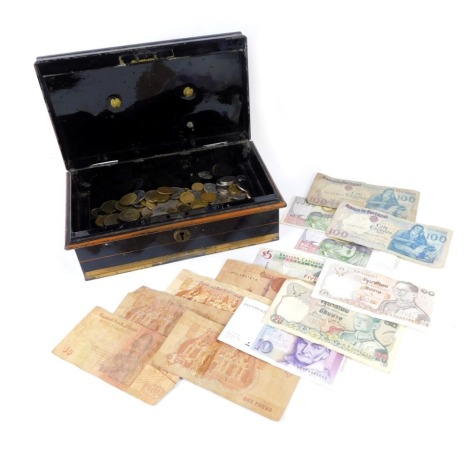 A tin box containing Middle Eastern coins and banknotes, to include Hong Kong dollars, loose Europe, Middle Eastern and other coinage, notes for Spain, The Caribbean, Middle East and Portugal, all enclosed in one tin. (a quantity)