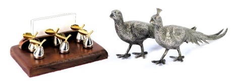 A set of six place card settings modelled as apples, each with a silvered and gold finish, and a pair of silver plated pheasants.