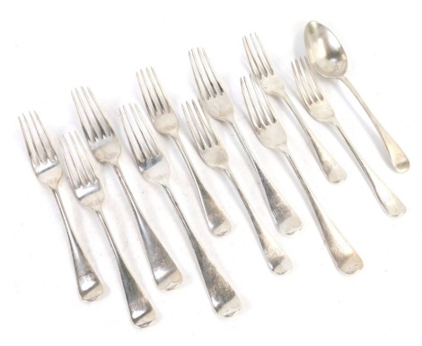 A group of Edward VII silver fiddle pattern cutlery, each bearing the initials CAM, Sheffield 1909, comprising three table forks, seven starter forks and a spoon, 19.56oz.