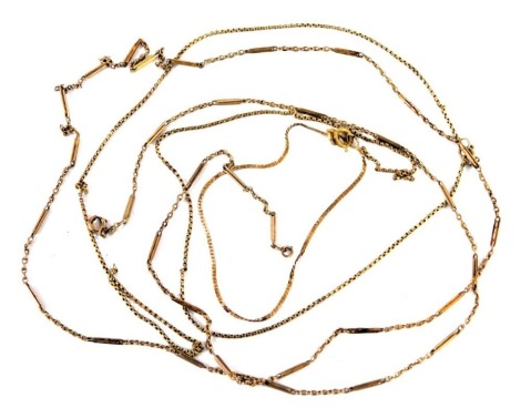 Three chains, comprising a box link neck chain, yellow metal stamped 375, a snake link bracelet, 16cm long, yellow metal stamped 375, and a fancy link necklace, yellow metal stamped 375, 11.9g all in. (AF). (3)