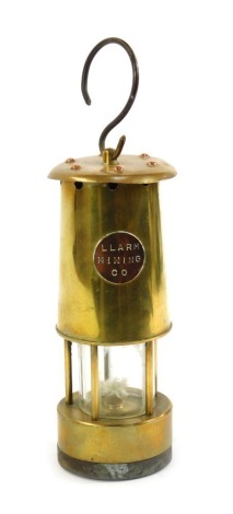 A LARM Mining Company copper and brass miner's lamp, 28cm high.