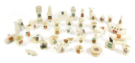 Swan and other crested china, to include an airship, Arms of Melton Mowbray, Queen Victoria statue of Windsor, with matched arms, Goss model of an Army water bottle, used at The Battle of Waterloo, Arms of Worthing, dog kennel, lifeboat, submarine, and an