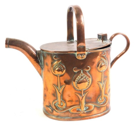 A Joseph Sankey & Son Arts and Crafts copper watering can, with stylised design of three tulips, stamped J S & S, 25cm high.