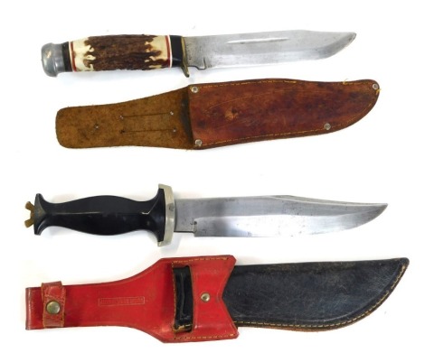 Two hunting knives, comprising Japanese sheath knife with antler handle, in leather scabbard, 32cm long, and a German knife, with curved blade, 31cm high. (2)