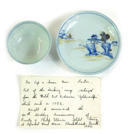 A Nanking Cargo tea bowl and saucer, of blue and white design, bearing label for Christie's 5194, the saucer 13cm diameter, the tea bowl 8cm diameter. (2)