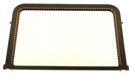 An early 20thC overmantel mirror, with a painted green frame, on ceramic bun feet with star gilded moulding, 65cm x 98cm.