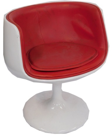 A 1960s ball swivel armchair, with red PVC upholstered seat. (AF) The upholstery in this lot does not comply with the 1988 (Fire & Fire Furnishing) Regulations, unless sold to a known exporter or upholsterer it will be cut from the frame before leaving th