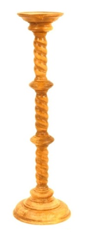 A turned beech torchere, with spiral twisted column, 100cm high, 22cm diameter.