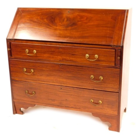 An Edwardian mahogany bureau, the fall flap opening to reveal a fitted interior with three drawers and green baize lining, above arrangement of three long drawers with brass swing handles, on bracket feet, 103cm high, 107vm wide, 48cm deep. (AF)