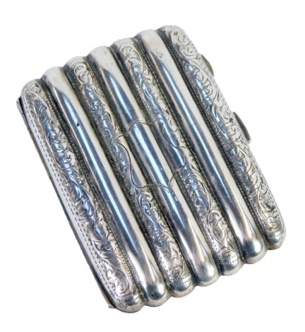 A George V silver cigar case, of fluted form, each alternate flute with engraved foliate decoration, Birmingham 1912, 2.26oz.