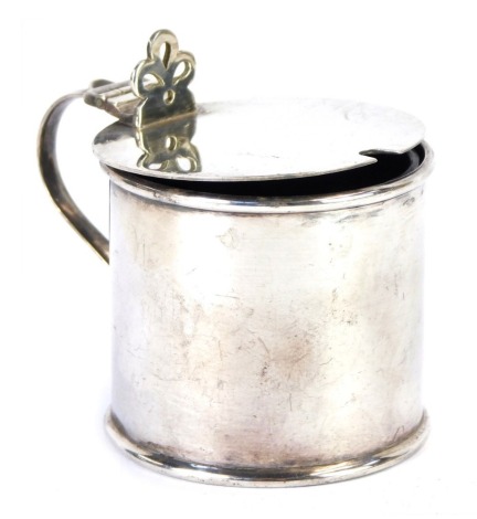 An Elizabeth II silver 'drum' mustard pot, of cylindrical form, with blue glass liner, Sheffield 1964, 3.61oz.