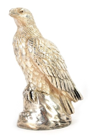 An Elizabeth II filled silver model of an eagle, perched on a rock, Sheffield 1998, 19.19oz all in, 14.5cm high.