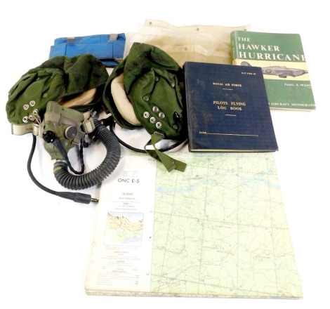 Two RAF issue cloth flight helmets, one with respirator and communications head cable, both as used by Ft/Lt Whaley, 47 Sqd., and two RAF brass buttons, and his RAF Flying Log Book, flight maps, etc.