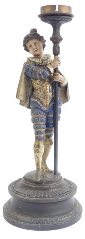 A late 19thC Continental cold painted spelter figure candlestick, cast as a Medieval gentleman, on a circular base, 35cm high.