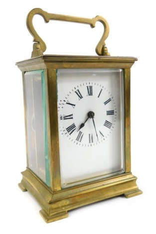 A French brass carriage clock, rectangular enamel dial bearing Roman numerals, single barrel movement, the case of conventional form, with key, 12cm high.