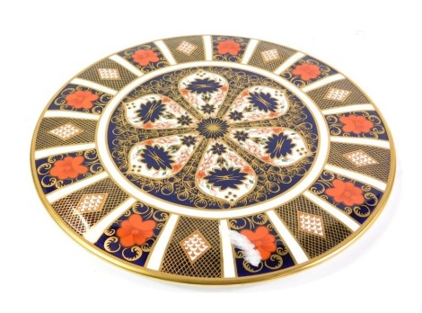 A Royal Crown Derby porcelain Imari cake plate, pattern 1182, 28cm wide.