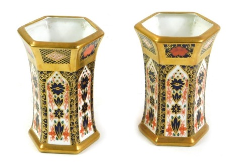 A pair of Royal Crown Derby Imari porcelain vases, of hexagonal form, pattern no 1128, 11.5cm high.