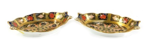 A pair of Royal Crown Derby Imari porcelain twin handled sweet meat dishes, of oval form, printed marks, 14cm wide.