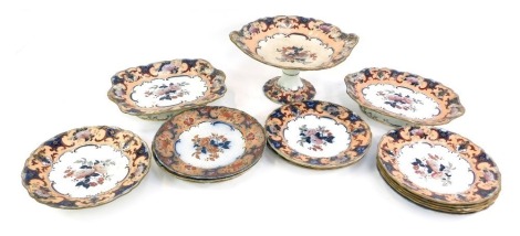 A late 19thC Wedgwood pottery dessert service, printed and painted with flowers, pattern number 2130, painted and impressed marks, comprising a comport, pair of rectangular pedestal dishes, circular pedestal dish, and eleven plates.