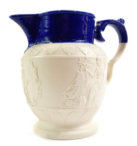 An early 19thC pottery Nelson commemorative jug, possibly Turner, sprig moulded with Admiral Lord Nelson within a laurel wreath, Britannia and lion, with soldiers, and a seated Britannia and lion with sailing ship, beneath acanthus leaf borders, 13cm high