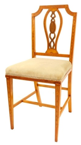 A Sheraton Revival marquetry inlaid satin wood chair, with delicate splat to the back and over upholstered seat, raised on slender square legs with plain stretchers.