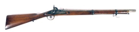 A 19thC percussion musket, with mahogany stock and brass trigger guard, with indistinct proof marks, and ram rod, 104cm long overall.