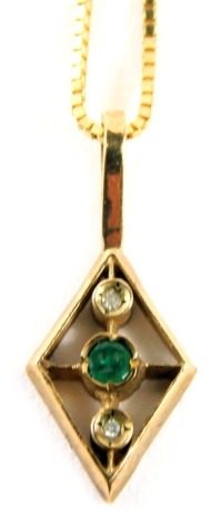 A 9ct gold emerald and diamond pendant and chain, the diamond shaped pendant set with central emerald and two tiny diamonds, with bar design back, 2cm high, on box link neck chain 40cm long, 2.8g all in.