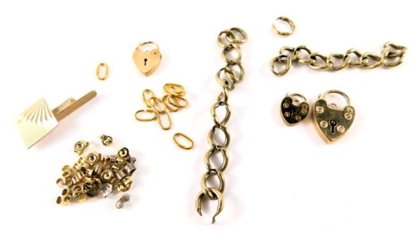 A group of loose 9ct and yellow metal, to include padlocks, links and earring backs, some marked, 26.2g all in.