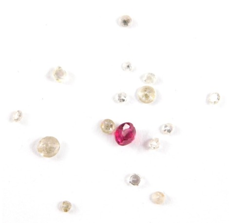 A group of loose rubies and diamonds, the largest diamond approx 0.14ct, the smallest approx 0.01ct, and an oval cut ruby approx 0.46ct. (a quantity)