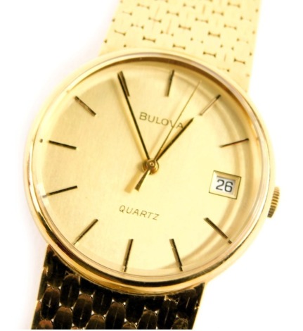 A Bulova gent's wristwatch, in a yellow metal casing a bracelet, stamped 9kt to watch and hallmarked 375 to strap, the circular dial with baton border and date aperture, on seventeen jewel quartz movement, 3cm diameter, on hammered design bracelet, 19cm l