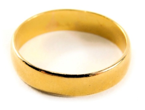 A 22ct gold wedding band, of plain design, ring size P½, 4.3g.