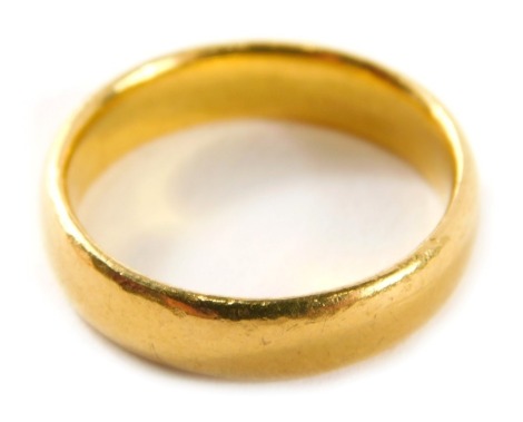 A wedding band, of plain design, yellow metal stamped 22ct, maker ACCS, ring size N½, 6.6g.