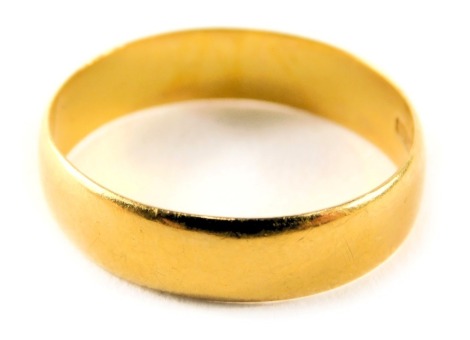 A 22ct gold wedding band, of plain design, maker WW Limited, ring size O½, 3.6g.