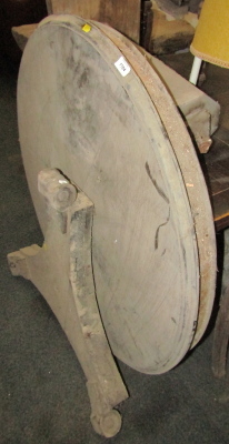 A 19thC table, the circular top on tapering column, terminating in a triform base with scroll feet. (AF)