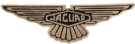 A metal Jaguar advertising sign, 49cm wide.