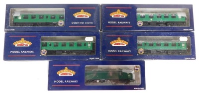 Bachmann Branchline OO gauge coaches, comprising 39-228A BR MK1 brake corridor composite BCK, malachite green livery, 39-128A BR MK1 composite CK, malachite green livery, 39-053B BR Mk1 open SOSR green livery, 39-028B BR MK1 corridor SKSR green livery, a