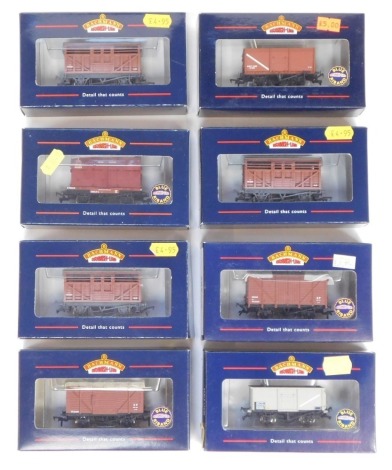 Bachmann Branchline OO gauge rolling stock, including 33-656 cattle wagon LMS brown weathered livery, 37-451 16 tonne slope sided riveted side door mineral wagon, BR brown livery, 37-951 conflat with BD crimson container BR, 33-656 cattle wagon LMS brown 