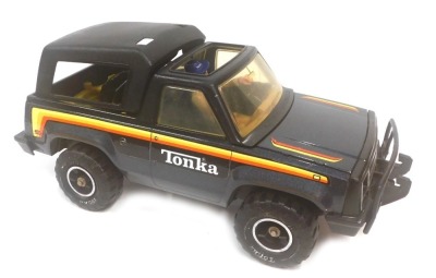 A Tonka Big Duke Bronco pick-up truck, with figure, tyre and jack.