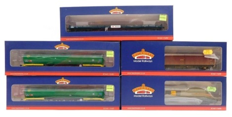 Bachmann Branchline OO gauge rolling stock, comprising 38-111B 100 tonne TEA Bogie tank wagon, BR green livery, 37-603A VGA sliding wall van EWS (weathered), 38-902 FVX car flat wagon, BR blue Motor Rail livery, and 38-034 HHA Bogie hopper wagon Colas (we